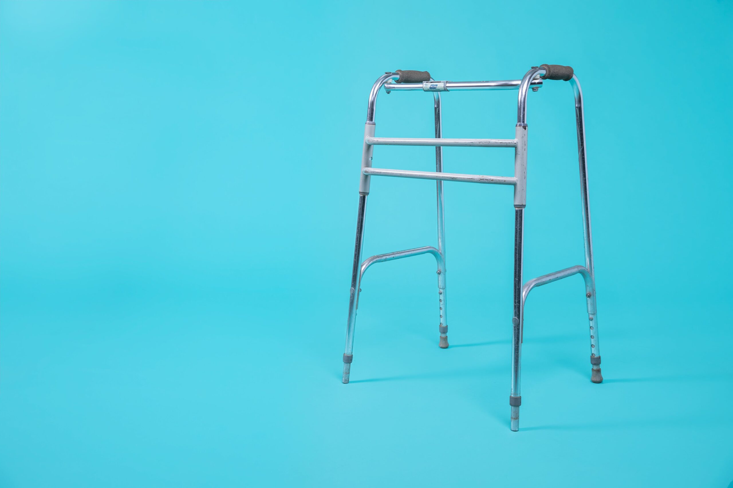 Zimmer frame walker on a blue background, from Burst.com